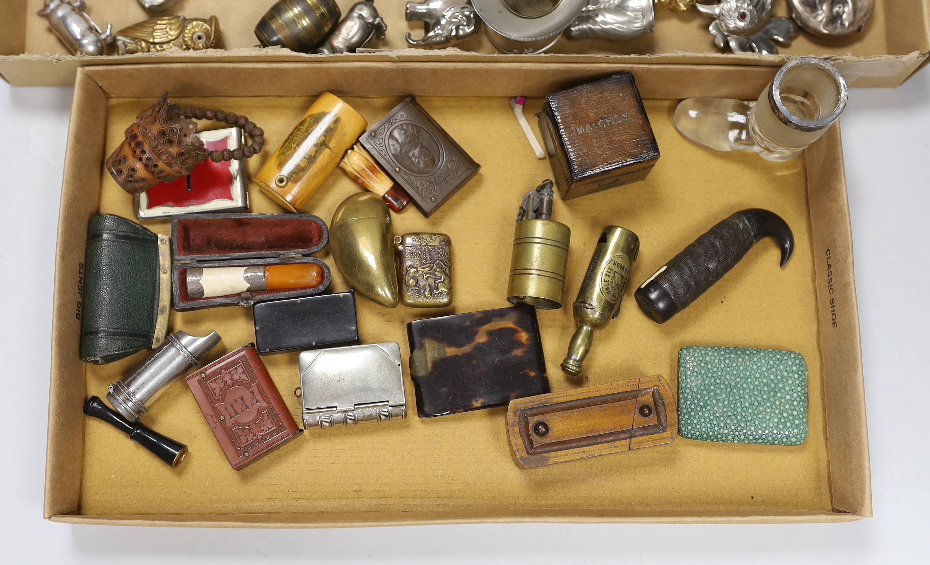 A collection of novelty vestas, matchbox holders etc.